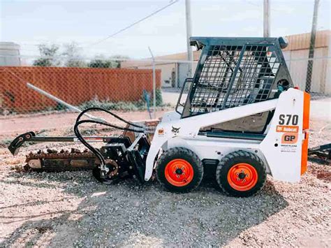 trencher for bobcat skid steer fl|bobcat skid steer trencher attachment.